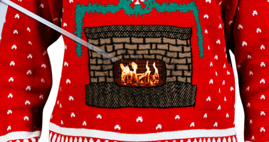スマホを装着することでお腹がパチパチと燃える暖炉になっちゃうセーター